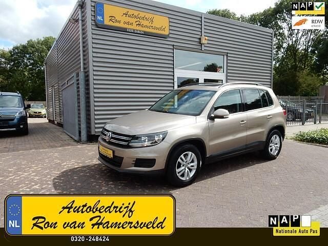 Goud, metallic lak Gebruikt 2016 VW Tiguan SUV | € 13.777 (Super prijs) - Afbeelding 1/3