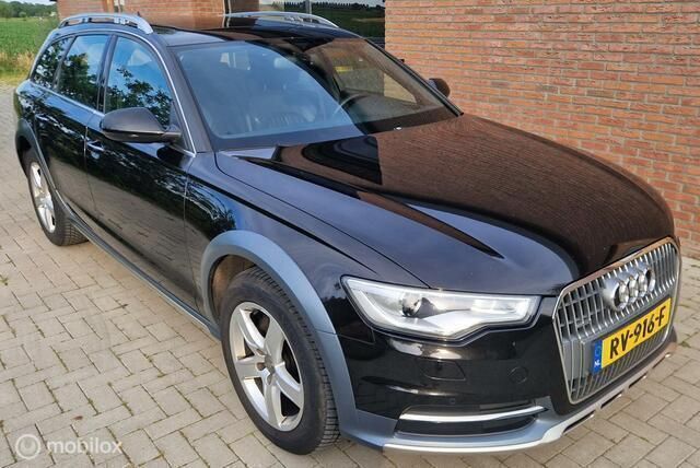 Bruin Gebruikt 2014 Audi A6 Allroad Premium Stationwagen | € 14.395 - Afbeelding 1/4