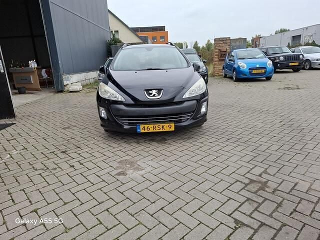 Zwart Gebruikt 2011 Peugeot 308 SW Stationwagen | € 1.999 (Super prijs) - Afbeelding 1/4