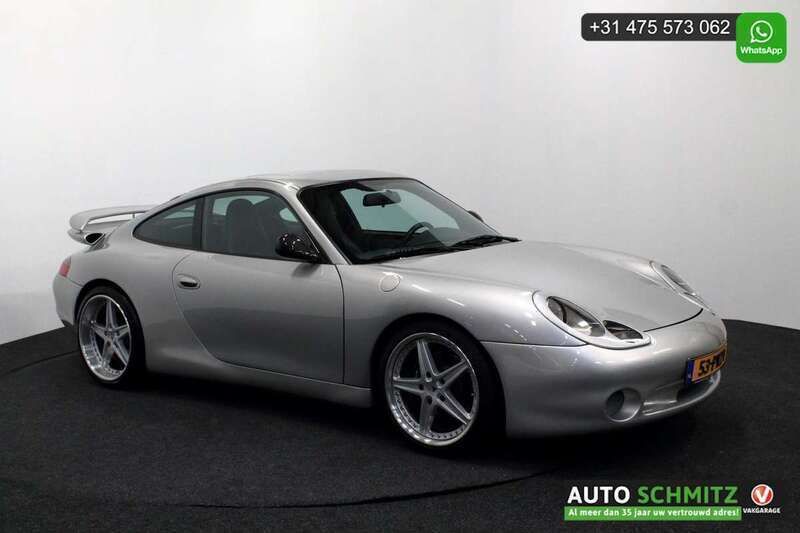 Grijs, metallic lak Gebruikt 1999 Porsche 911 Carrera Coupé | € 49.950 - Afbeelding 1/4
