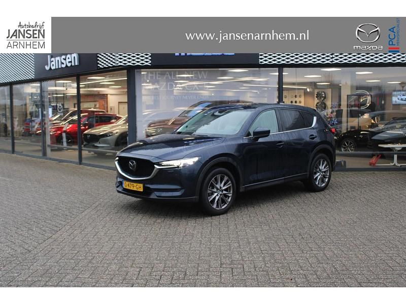Deep crystal blue (donker blauw) Occasion 2019 Mazda CX-5 Luxury SUV | € 26.450 (Eerlijke prijs) - Afbeelding 1/4