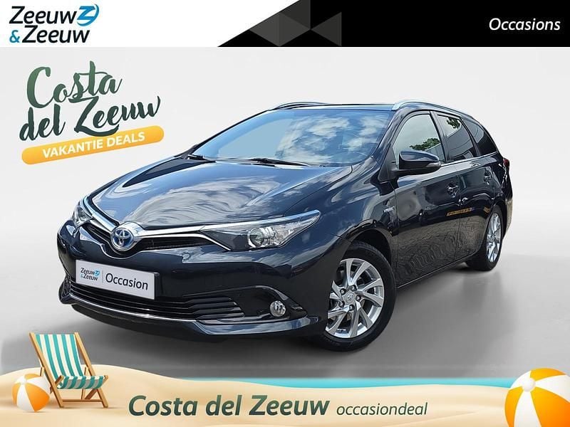 Grijs Gebruikt 2015 Toyota Auris Touring Sports Stationwagen | € 13.940 (Eerlijke prijs) - Afbeelding 1/4