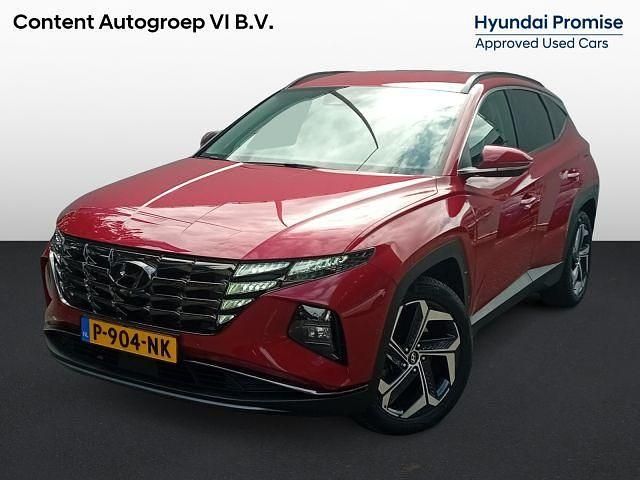 Rood metallic Gebruikt 2021 Hyundai Tucson Premium SUV | € 29.940 (Eerlijke prijs) - Afbeelding 1/1