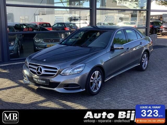 Grijs, metallic lak Gebruikt 2015 Mercedes E200 Avantgarde Sedan | € 19.950 (Eerlijke prijs) - Afbeelding 1/4