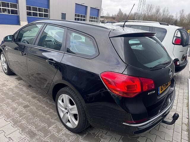 Occasion Opel Astra Cosmo 110 PK (80 kW) 2011 Zwart Stationwagen