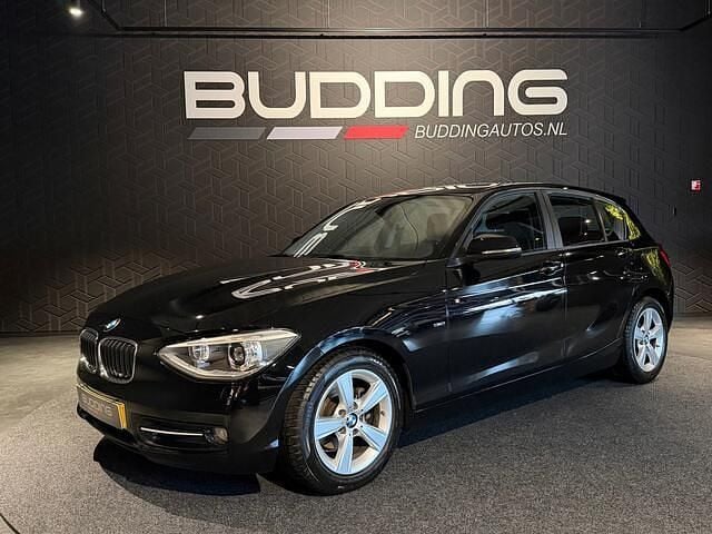 Zwart Gebruikt 2014 BMW 114 Sport Line Hatchback | € 9.950 (Iets duurder) - Afbeelding 1/4