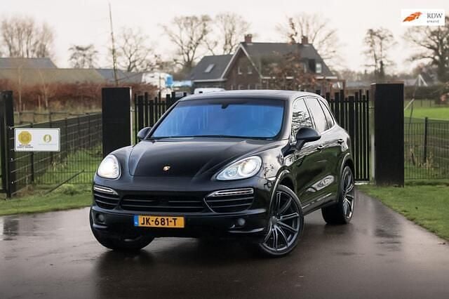 Zwart Occasion 2013 Porsche Cayenne SUV | € 24.500 (Goede deal) - Afbeelding 1/4