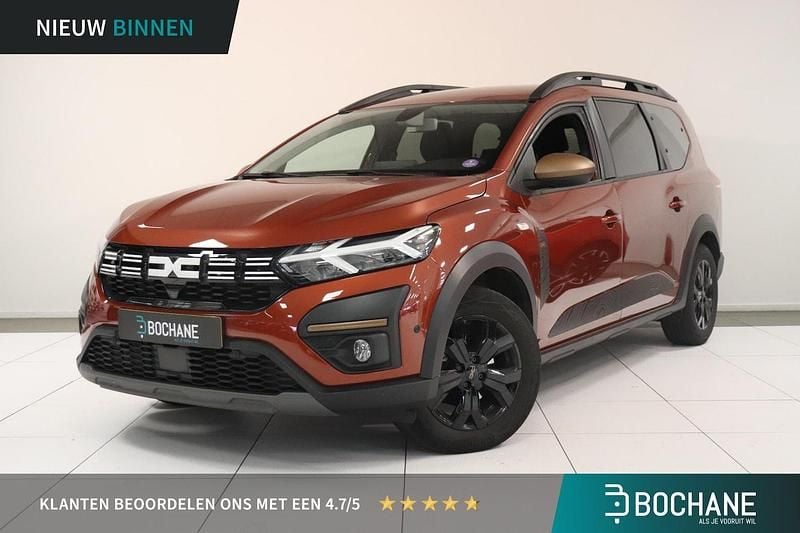 Bruin Gebruikt 2023 Dacia Jogger Extreme MPV | € 24.900 - Afbeelding 1/4