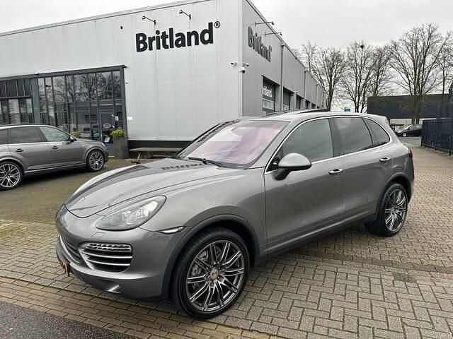 Grijs (metallic) Gebruikt 2011 Porsche Cayenne SUV | € 19.950 (Eerlijke prijs) - Afbeelding 1/4
