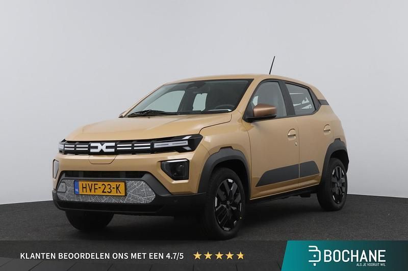 Bruin Nieuw 2025 Dacia Spring Extreme Hatchback | € 17.245 - Afbeelding 1/4