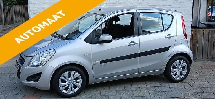 Zilver (metallic) Gebruikt 2013 Suzuki Splash Comfort Hatchback | € 11.499 (Duur) - Afbeelding 1/4