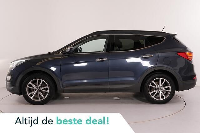 Blauw, metallic lak Gebruikt 2013 Hyundai Santa Fe Edition SUV | € 14.950 - Afbeelding 1/4