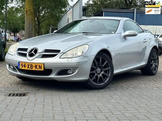 Grijs, metallic lak Gebruikt 2007 Mercedes SLK200 Edition Cabriolet | € 9.450 (Goede deal) - Afbeelding 1/4