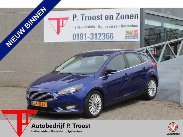 Blauw Gebruikt 2015 Ford Focus Titanium Hatchback | € 11.950 (Eerlijke prijs) - Afbeelding 1/4