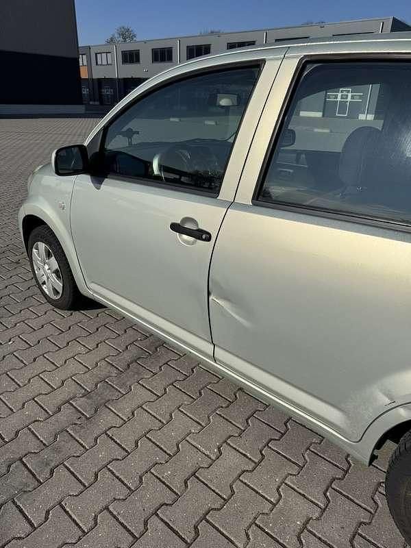 Occasion Daihatsu Sirion 87 PK (63 kW) 2005 Beige Hatchback