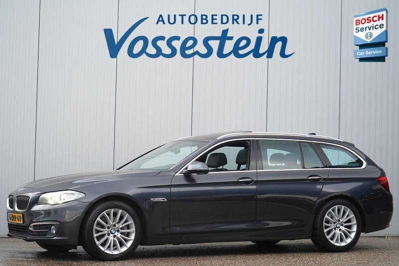 Grijs, metallic lak Gebruikt 2015 BMW 520 Executive Stationwagen | € 12.500 (Eerlijke prijs) - Afbeelding 1/4