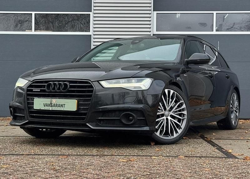Zwart Gebruikt 2014 Audi A6 Premium Stationwagen | € 20.950 - Afbeelding 1/4