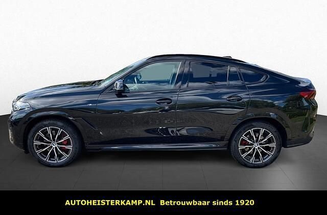 Zwart Gebruikt 2024 BMW X6 M Sport SUV | € 117.950 - Afbeelding 1/4