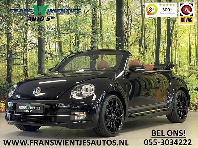 Zwart, metallic lak Gebruikt 2014 VW Beetle Sportline Cabriolet | € 19.749 (Eerlijke prijs) - Afbeelding 1/4