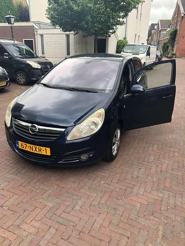 Blauw Gebruikt 2010 Opel Corsa S MPV | € 2.100 (Eerlijke prijs) - Afbeelding 1/4