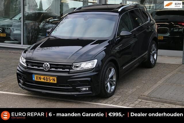 Zwart (metallic) Occasion 2019 VW Tiguan R-line SUV | € 18.995 (Super prijs) - Afbeelding 1/4