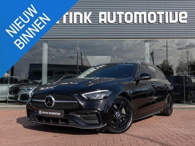 Zwart Occasion 2021 Mercedes C220 AMG line Sedan | € 38.940 (Eerlijke prijs) - Afbeelding 1/4
