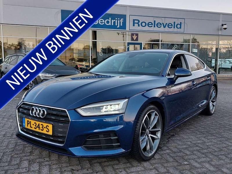 Blauw (metallic) Gebruikt 2017 Audi A5 Sportback Proline Hatchback | € 22.450 (Eerlijke prijs) - Afbeelding 1/3