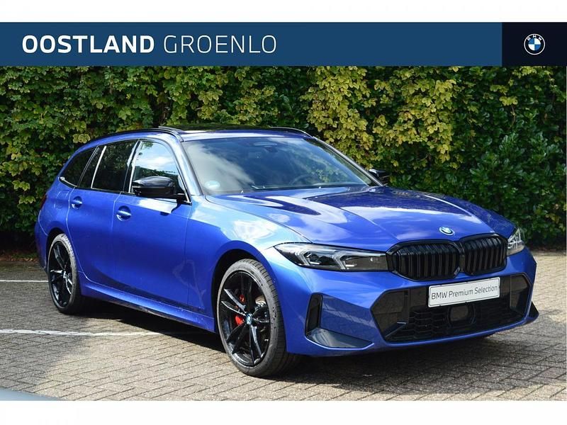 Portimao blau (blauw metallic) Gebruikt 2024 BMW 330e Comfort Edition Stationwagen | € 57.950 (Duur) - Afbeelding 1/4