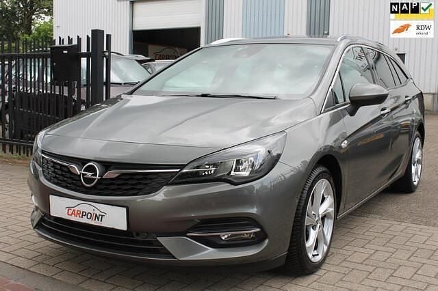 Grijs Gebruikt 2021 Opel Astra Ultimate Stationwagen | € 13.795 (Eerlijke prijs) - Afbeelding 1/4