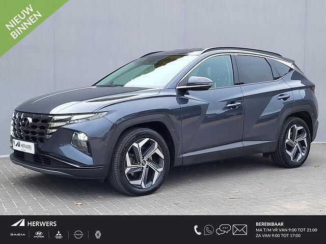 Dark knight pearl (yg7) Gebruikt 2022 Hyundai Tucson Premium SUV | € 30.935 (Eerlijke prijs) - Afbeelding 1/4