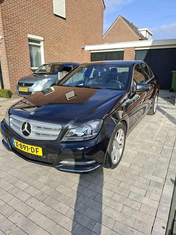 Occasion Mercedes C180 156 PK (114 kW) 2012 Zwart Stationwagen