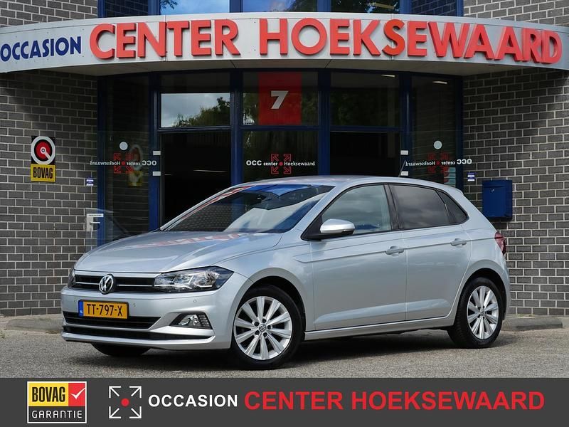 Grijs Gebruikt 2018 VW Polo Highline Hatchback | € 12.885 (Eerlijke prijs) - Afbeelding 1/4
