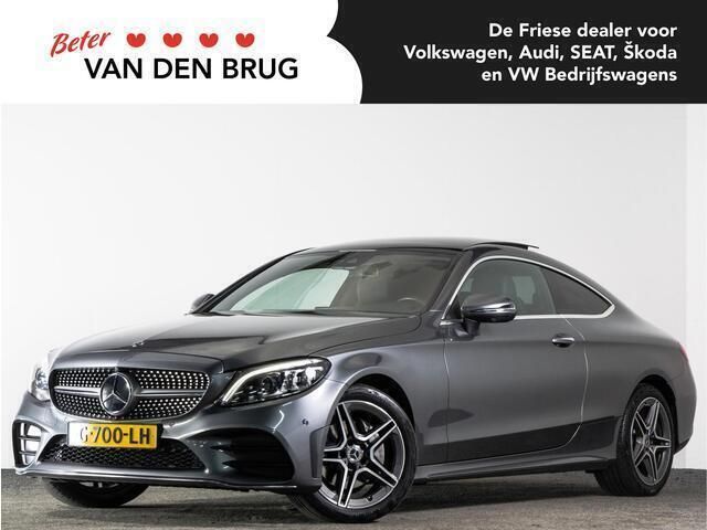 Grijs, metallic lak Gebruikt 2019 Mercedes C180 AMG line Coupé | € 26.900 - Afbeelding 1/4