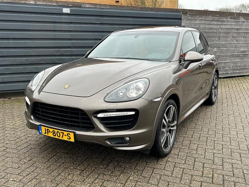 Bruin (metallic) Gebruikt 2014 Porsche Cayenne SUV | € 35.750 (Eerlijke prijs) - Afbeelding 1/4
