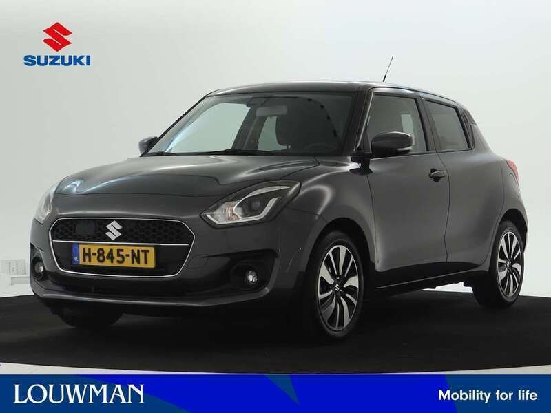 Grijs metallic Gebruikt 2020 Suzuki Swift Hatchback | € 15.945 (Eerlijke prijs) - Afbeelding 1/3