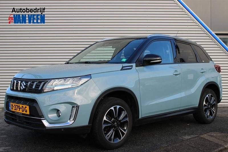 Blauw Gebruikt 2023 Suzuki Vitara Style SUV | € 23.690 (Eerlijke prijs) - Afbeelding 1/4