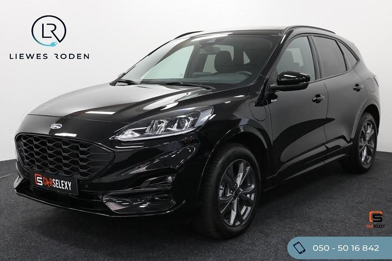 Zwart (metallic) Gebruikt 2022 Ford Kuga ST-Line X SUV | € 30.950 (Iets duurder) - Afbeelding 1/4