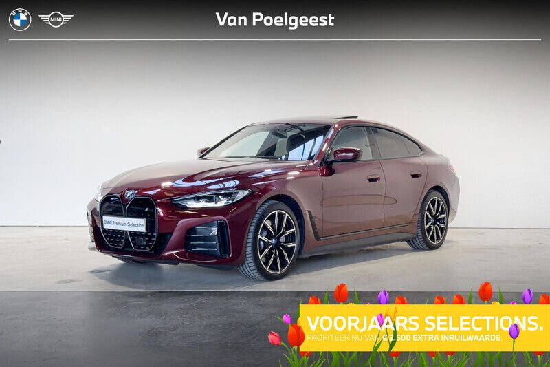 Rood, metallic lak Gebruikt 2024 BMW i4 Executive Sedan | € 48.900 (Goede deal) - Afbeelding 1/4
