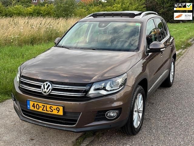 Bruin Gebruikt 2013 VW Tiguan Sport SUV | € 10.749 (Eerlijke prijs) - Afbeelding 1/4