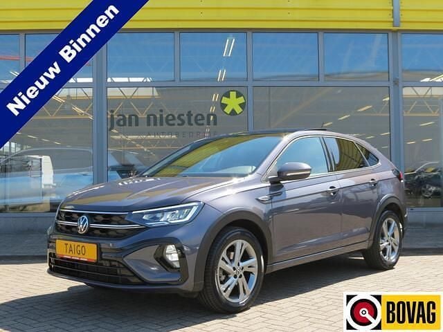 Grijs Gebruikt 2024 VW Taigo R-line SUV | € 30.950 (Iets duurder) - Afbeelding 1/4