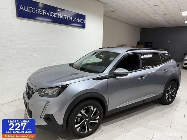 Grijs Gebruikt 2021 Peugeot e-2008 GTi SUV | € 15.950 (Eerlijke prijs) - Afbeelding 1/4