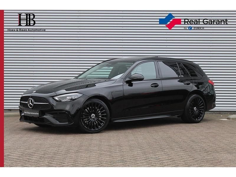 Occasion Mercedes C300 AMG line 204 PK (150 kW) 2022 Zwart Stationwagen