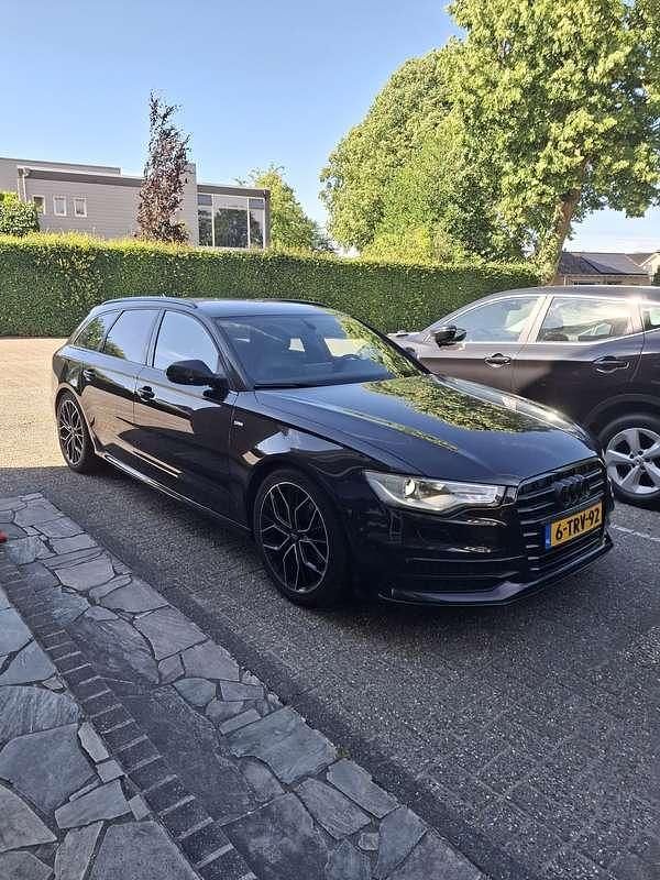 Zwart Gebruikt 2014 Audi A6 Sport Stationwagen | € 19.900 (Iets duurder) - Afbeelding 1/4