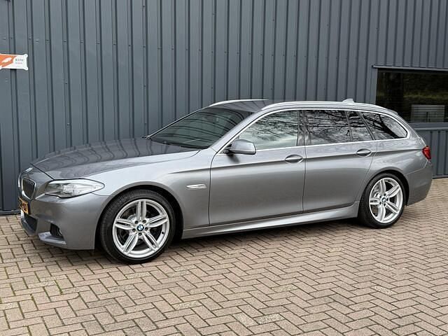 Grijs Occasion 2013 BMW 520 Executive Stationwagen | € 15.495 (Eerlijke prijs) - Afbeelding 1/4