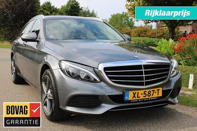 Grijs Gebruikt 2017 Mercedes C180 Prestige Stationwagen | € 19.650 (Eerlijke prijs) - Afbeelding 1/4
