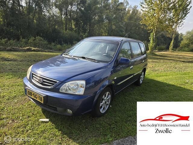 Blauw Gebruikt 2006 Kia Carens EX MPV | € 9.999 - Afbeelding 1/4