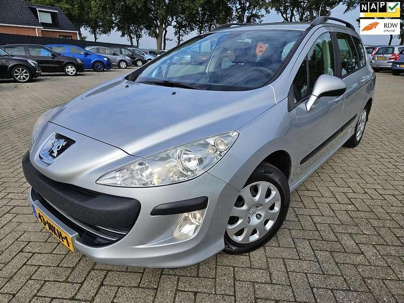 Grijs Gebruikt 2010 Peugeot 308 Stationwagen | € 1.450 (Eerlijke prijs) - Afbeelding 1/4