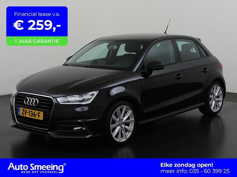 Metallic mythical black (0e) Gebruikt 2018 Audi A1 Sportback S-Line Hatchback | € 19.945 (Duur) - Afbeelding 1/4