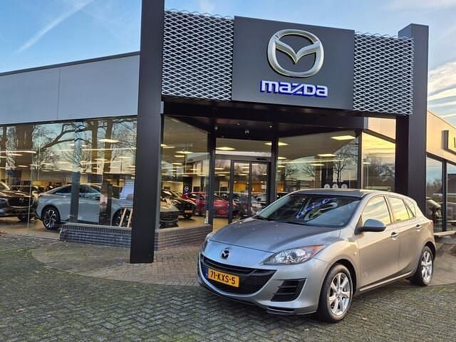 Grijs (metallic) Gebruikt 2010 Mazda 3 Hatchback | € 7.950 (Goede deal) - Afbeelding 1/4