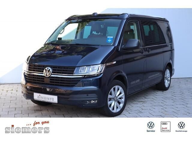 Blauw Occasion 2023 VW Transporter Beach Van | € 77.216 - Afbeelding 1/4